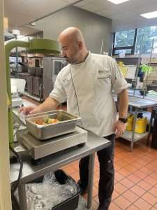 Chef-Tim-Morris-Using-Leanpath-System-225x300